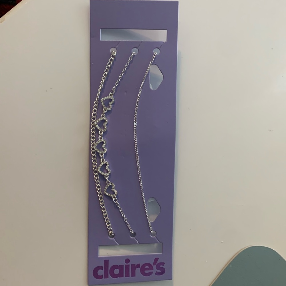 Claire’s silver 3 peice choker necklace.